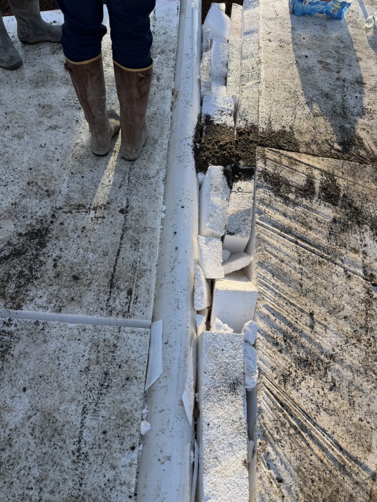 Geofoam installed with utility in middle